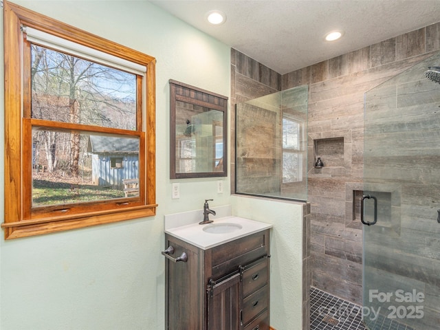 bathroom featuring vanity and walk in shower