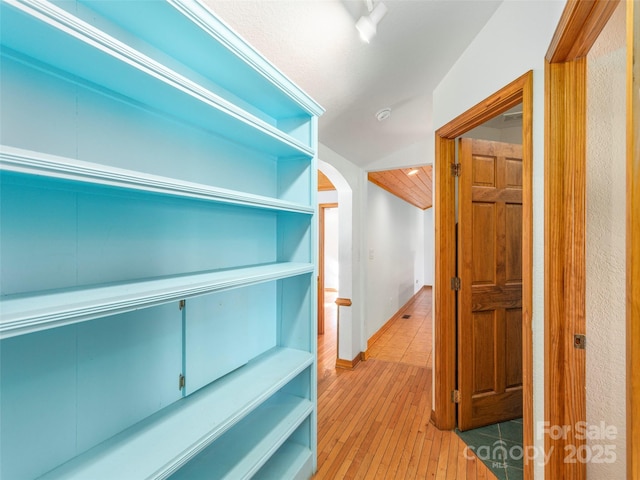 hallway featuring light wood-type flooring