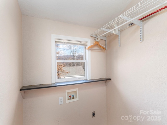 laundry area featuring hookup for an electric dryer and washer hookup