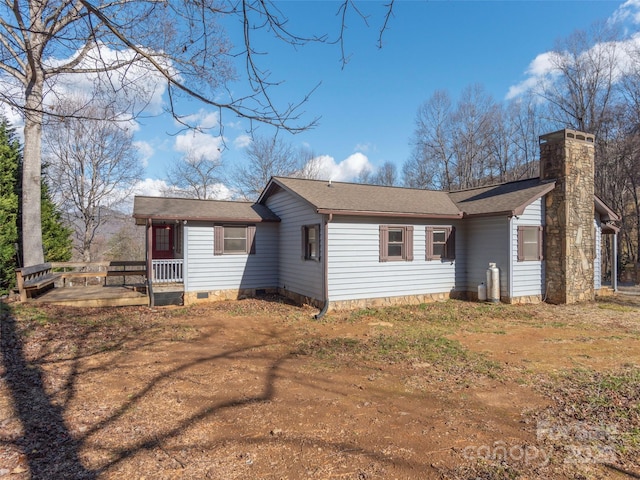 back of property featuring a patio