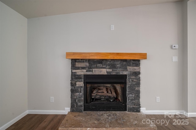 details featuring a fireplace and hardwood / wood-style floors