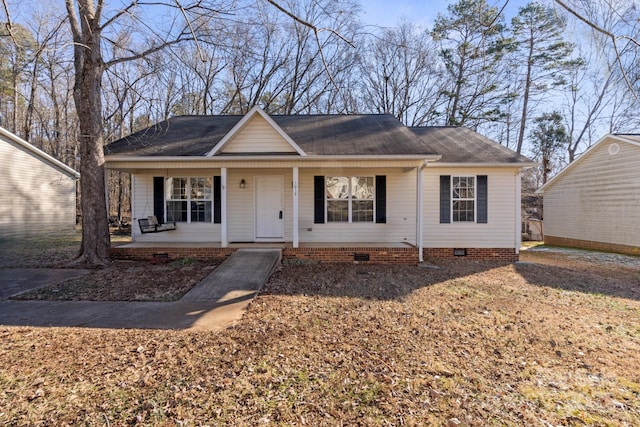 single story home with a porch