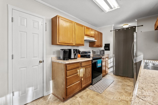 kitchen featuring a textured ceiling, ornamental molding, and appliances with stainless steel finishes