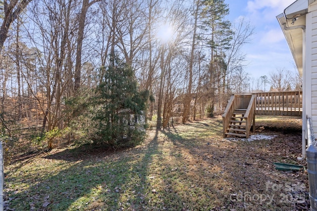 view of yard featuring a deck