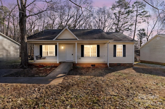 ranch-style home with covered porch