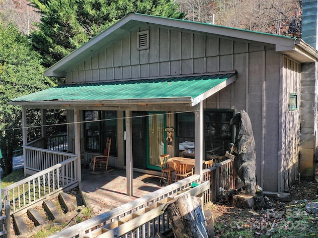 41 Cottontail Ln, Canton, NC 28716 - back of house with metal roof, a deck, and board and batten siding
