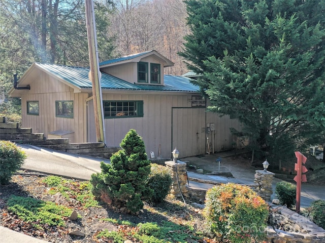 41 Cottontail Ln, Canton, NC 28716 - view of front of house with metal roof and board and batten siding