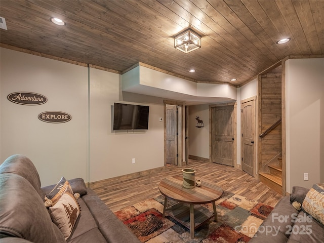 living room featuring hardwood / wood-style flooring and wooden ceiling