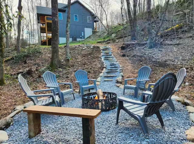 view of patio with an outdoor fire pit