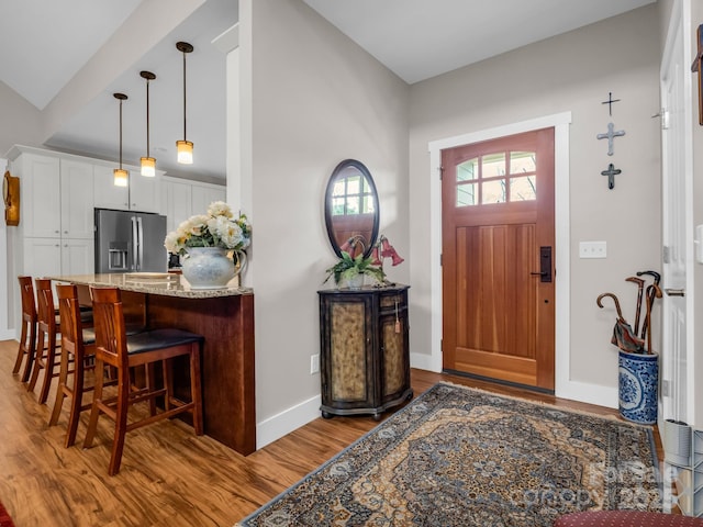 foyer featuring light wood-type flooring