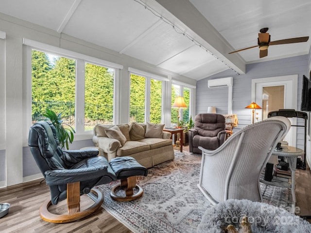 sunroom with vaulted ceiling with beams, ceiling fan, and a wall mounted AC