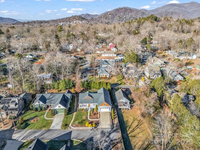 drone / aerial view featuring a mountain view