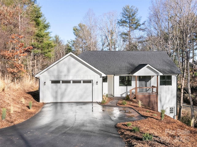 ranch-style house featuring a garage