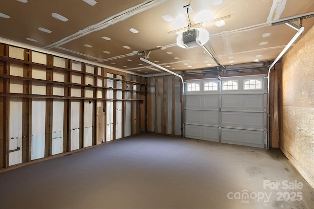 garage featuring a garage door opener