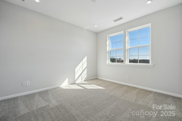 view of carpeted spare room