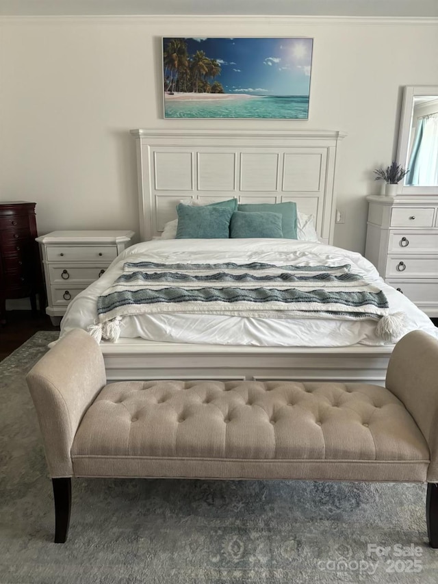 bedroom featuring ornamental molding