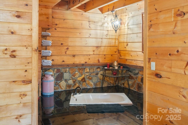 bathroom featuring wooden walls