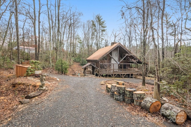 view of front of property featuring a wooden deck