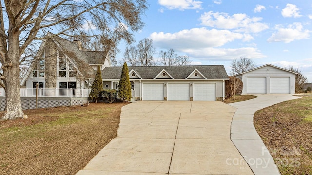 ranch-style home featuring a garage and a front lawn