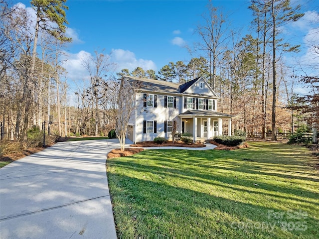 view of front of property with covered porch and a front yard