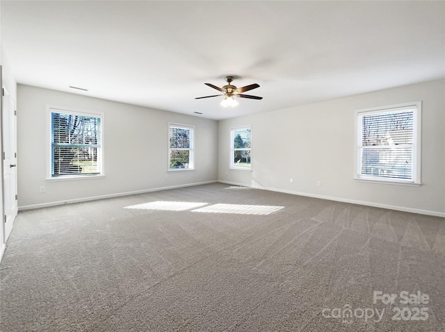 carpeted empty room with ceiling fan