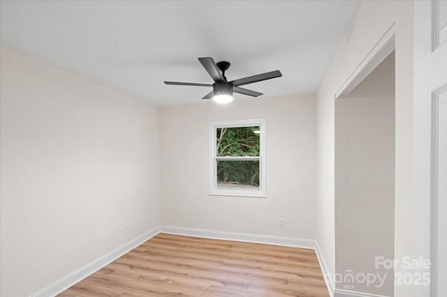 empty room with light hardwood / wood-style flooring and ceiling fan