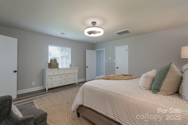 bedroom featuring dark hardwood / wood-style floors