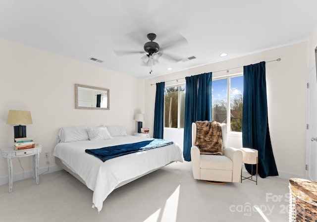 carpeted bedroom featuring ceiling fan