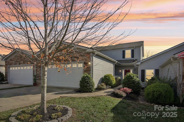 view of front of property featuring a garage