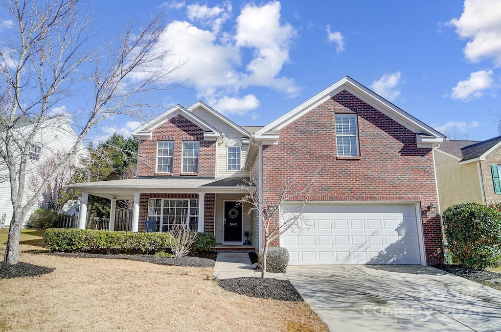 front facade with a garage