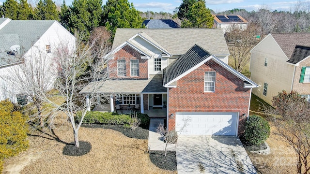 front of property featuring a garage