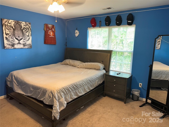 9624 Langston Mill Rd, Charlotte, NC 28216 - bedroom with visible vents, a ceiling fan, carpet, and baseboards