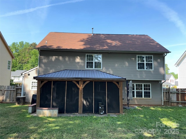 9624 Langston Mill Rd, Charlotte, NC 28216 - back of property with a lawn, central AC unit, fence, and a sunroom
