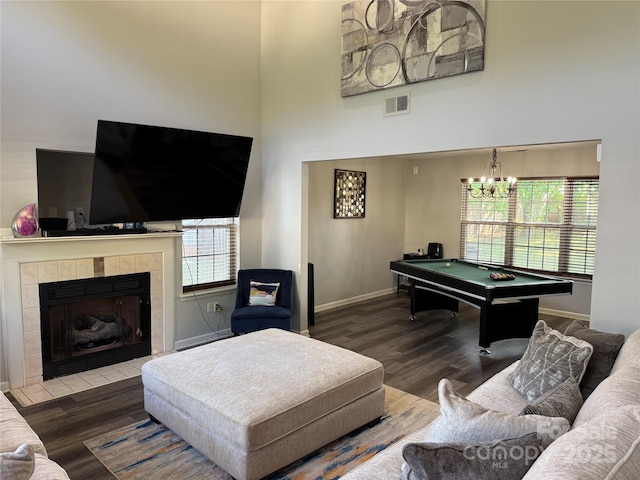 9624 Langston Mill Rd, Charlotte, NC 28216 - living room with a towering ceiling, pool table, wood finished floors, and visible vents