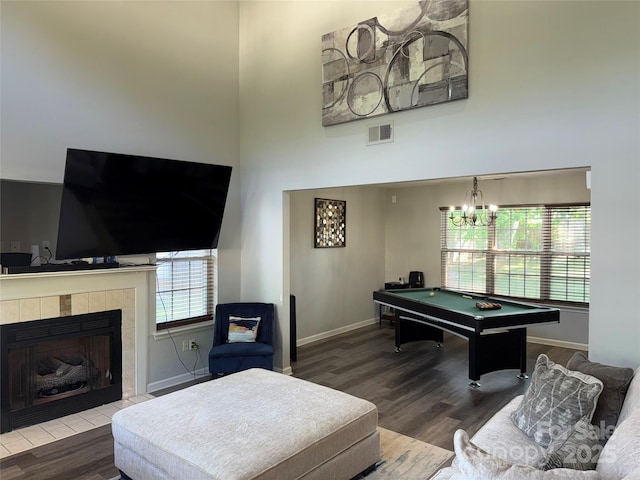 9624 Langston Mill Rd, Charlotte, NC 28216 - living room with visible vents, a towering ceiling, wood finished floors, baseboards, and billiards