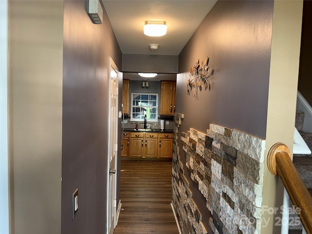 9624 Langston Mill Rd, Charlotte, NC 28216 - hallway featuring a sink, dark wood finished floors, and stairs