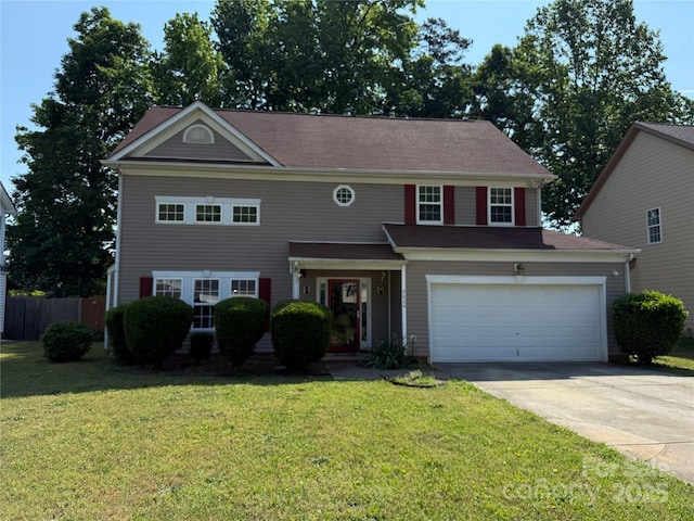 9624 Langston Mill Rd, Charlotte, NC 28216 - view of front of property with fence, an attached garage, driveway, and a front lawn