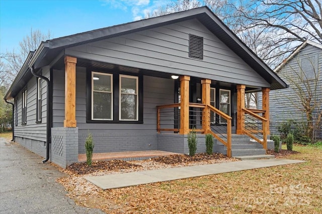 bungalow-style home with covered porch