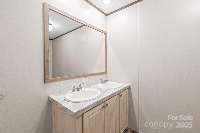 bathroom with double vanity and a sink