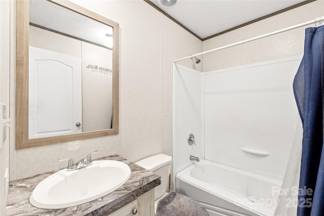 full bath featuring toilet, ornamental molding, shower / bath combo, a textured ceiling, and vanity