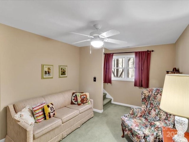 living room with light carpet and ceiling fan