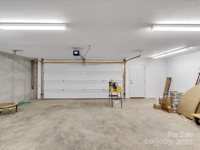 garage featuring a garage door opener