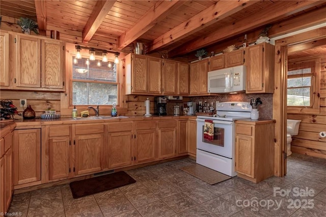 kitchen featuring wood ceiling, white appliances, sink, beamed ceiling, and wood walls