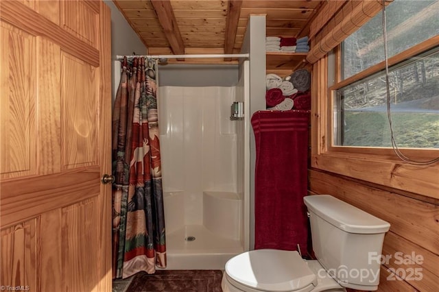 bathroom featuring wooden ceiling, walk in shower, lofted ceiling with beams, toilet, and wooden walls