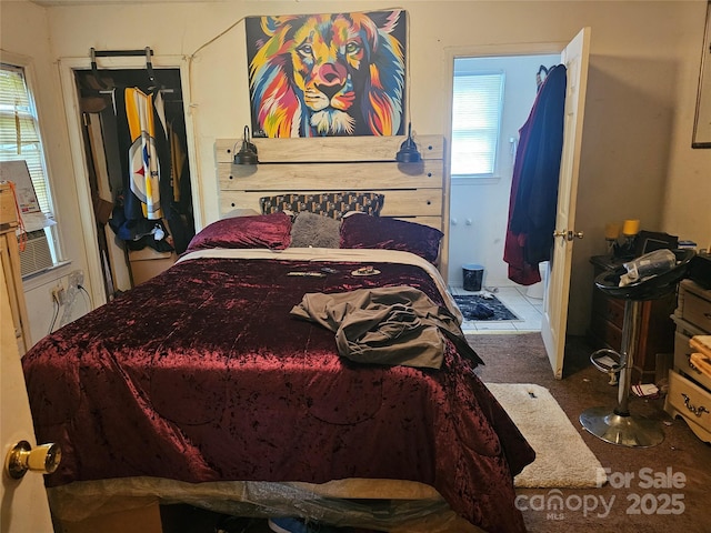 bedroom featuring carpet flooring