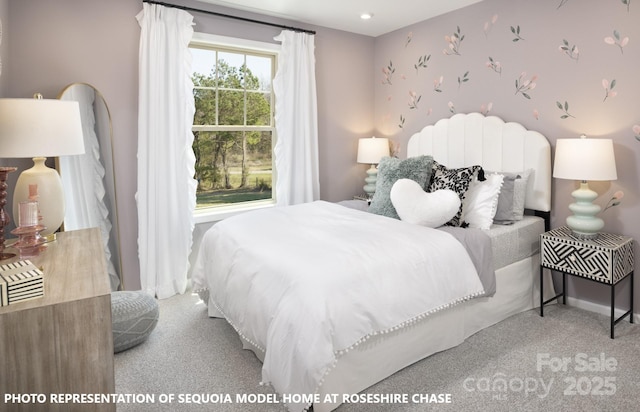 bedroom featuring carpet flooring and wallpapered walls