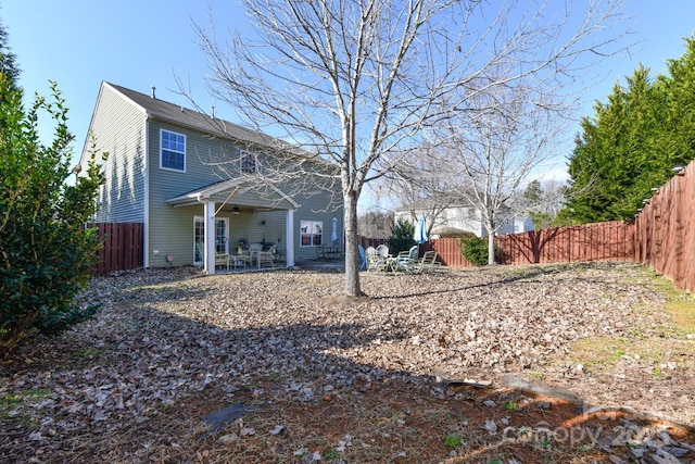 back of property with a patio area