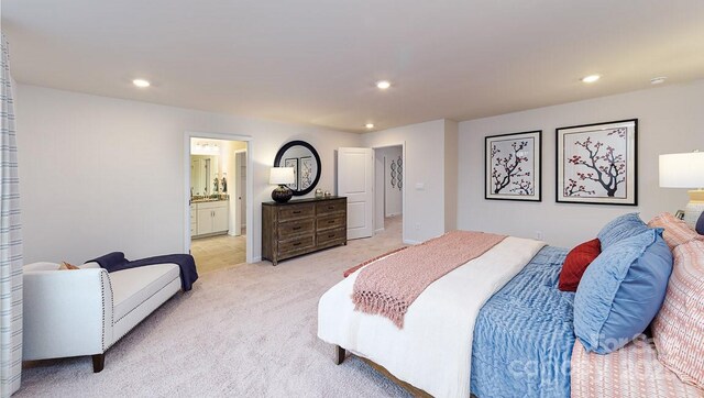 carpeted bedroom with connected bathroom