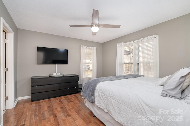 bedroom featuring ceiling fan and wood-type flooring