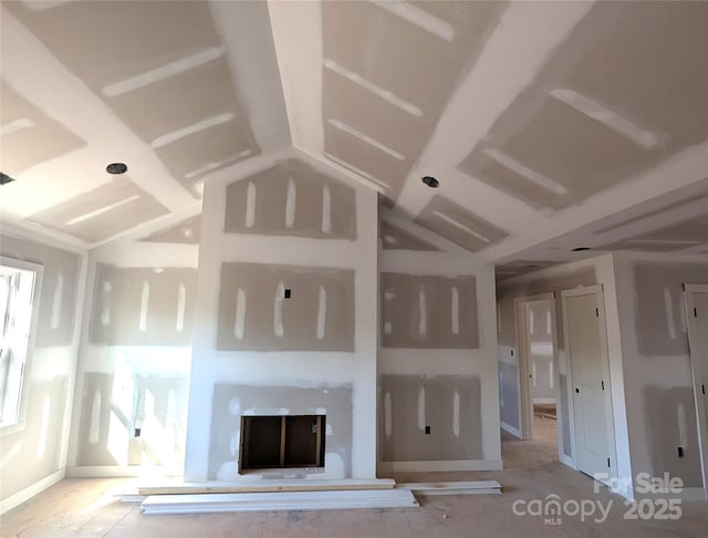 unfurnished living room featuring a fireplace